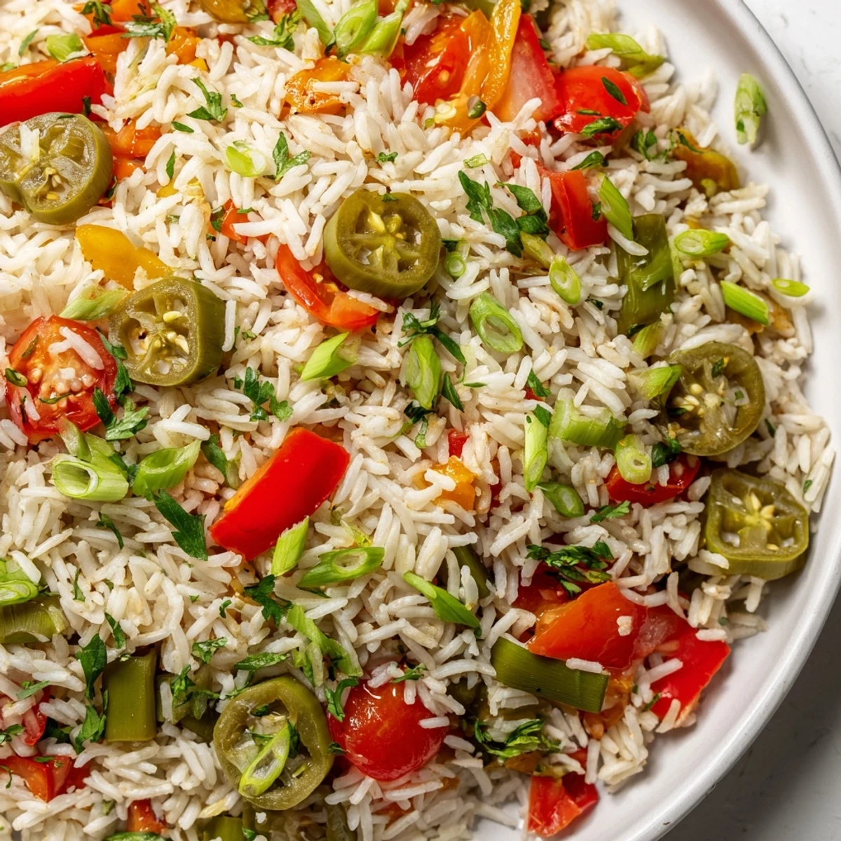 A hearty serving of Mardi Gras Veggie Jambalaya with okra and zucchini in a Dutch oven