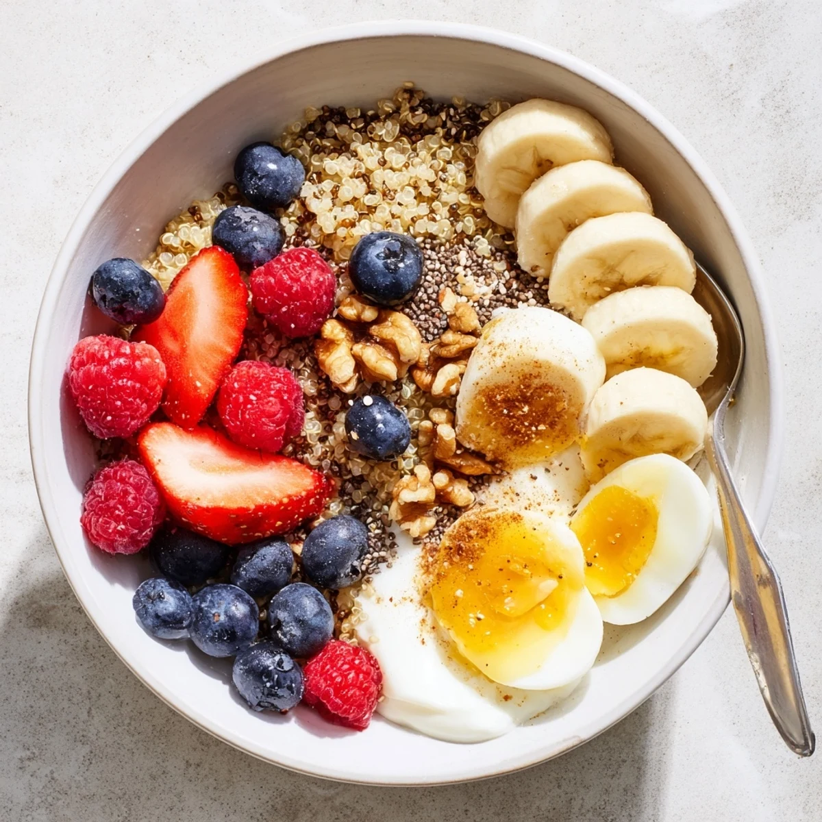 Morning sunlight highlights the Dietitians Balanced Breakfast Bowl, packed with chia seeds, berries, and cinnamon for a nourishing start.