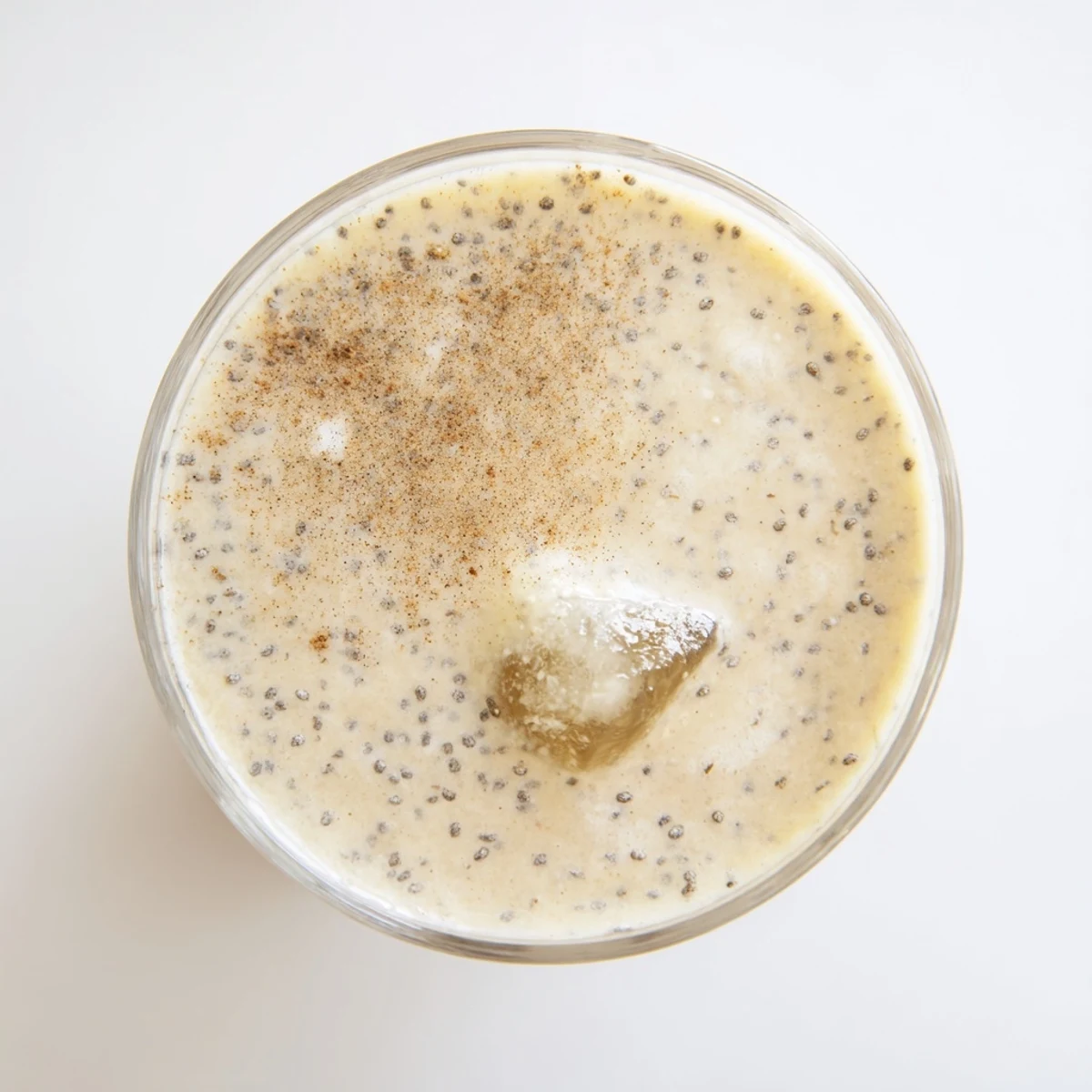 Golden Greek yogurt banana smoothie blending frozen fruit and vanilla for a refreshing breakfast treat