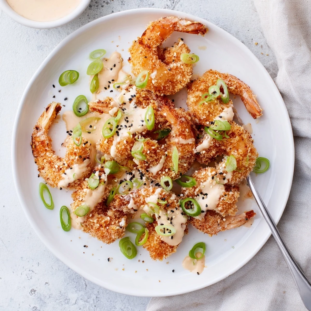 Crispy fried Bang Bang Shrimp drizzled with sweet chili Sriracha mayonnaise glaze