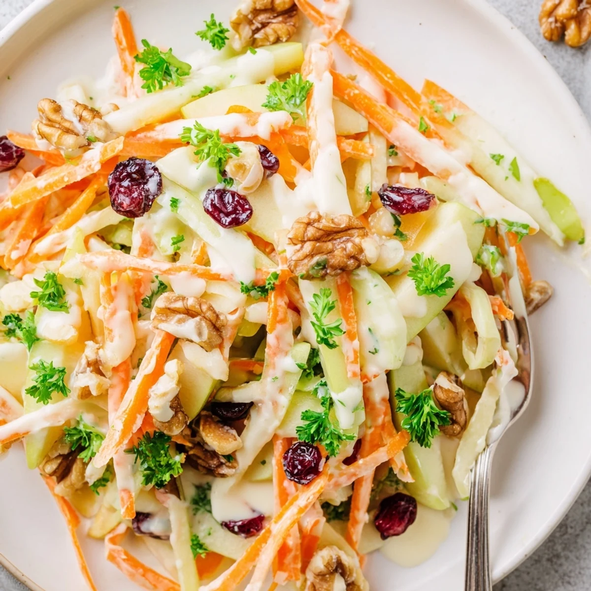 Crunchy Apple Carrot Salad With Creamy Citrus Dressing served chilled, zesty and crunchy