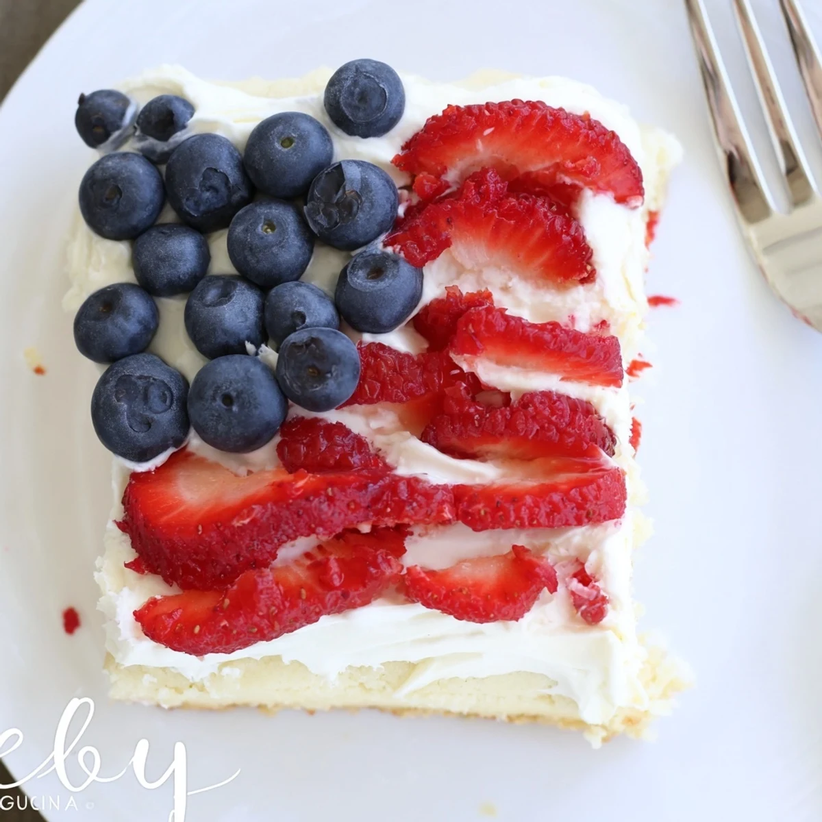 Chilled Sugar Cookie Flag Fruit Pizza sliced for summer picnics with lemonade
