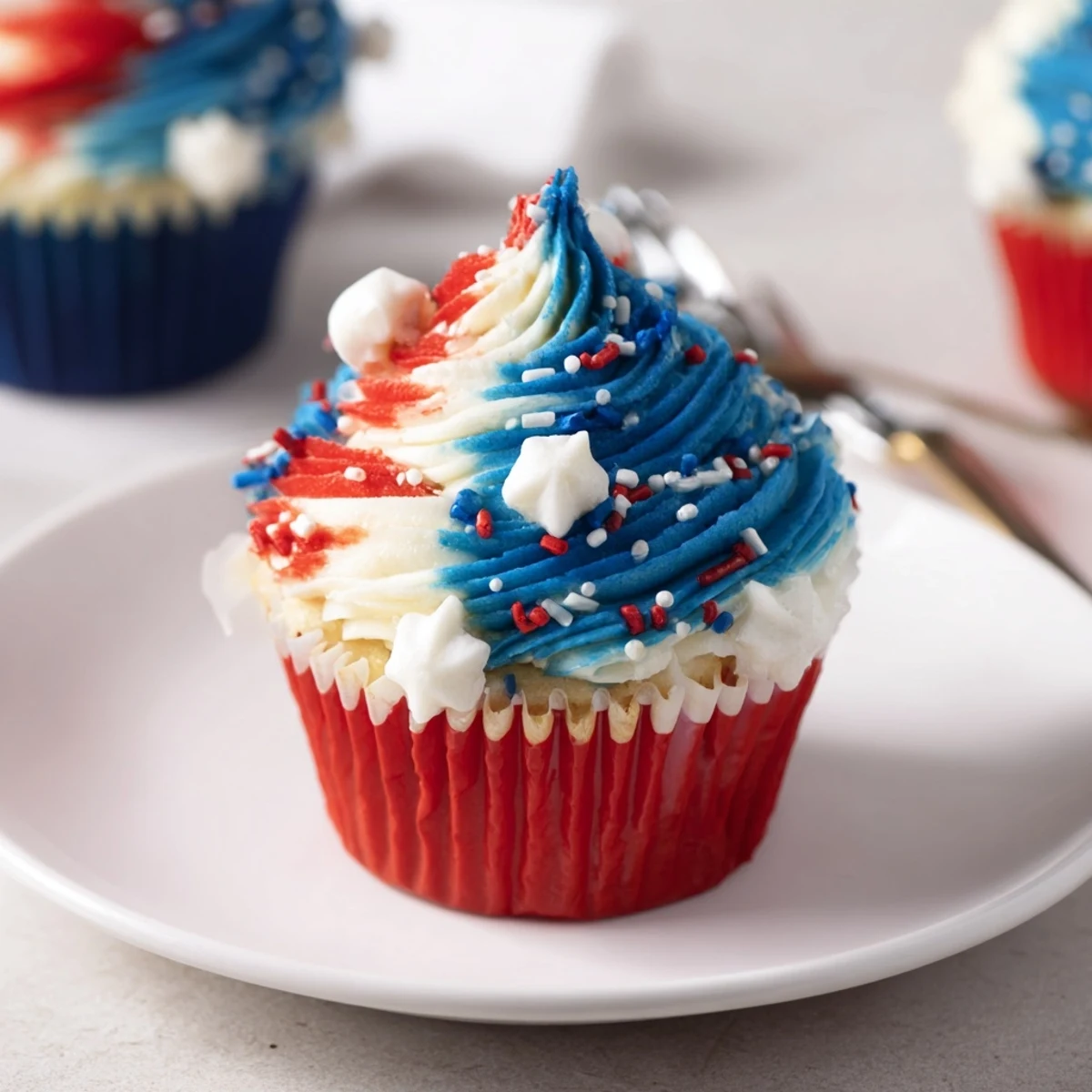 Freshly baked Patriotic Firework Cupcakes on cooling rack, ready to serve