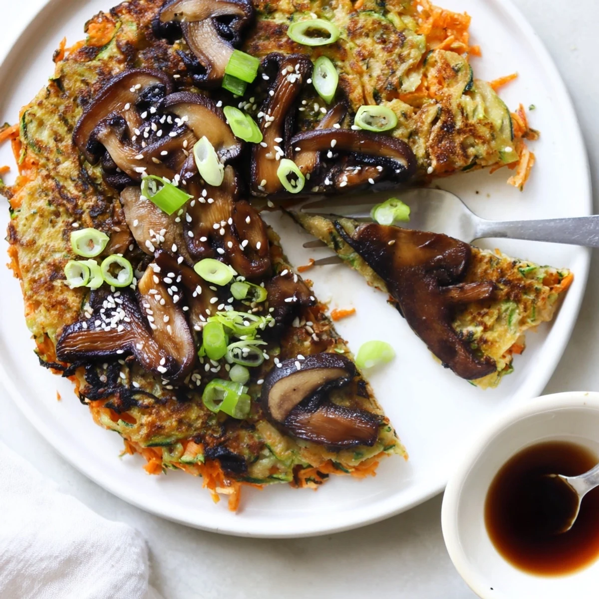 Golden Vegan Kimchi Pancake With Tamari Mushrooms, tender interior, umami-packed topping